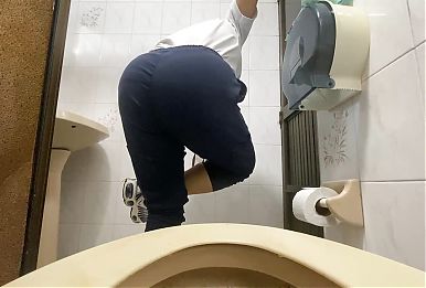Careless nurse is filmed in public restroom in office